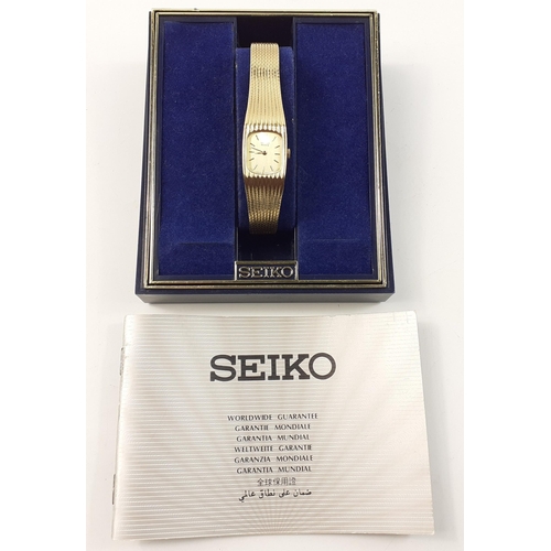 47 - A boxed SEIKO quartz ladies cocktail watch in broken box with instruction manual.  Watch in nice con... 