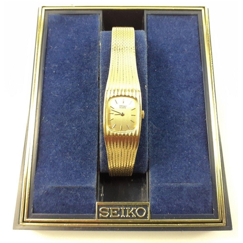 47 - A boxed SEIKO quartz ladies cocktail watch in broken box with instruction manual.  Watch in nice con... 