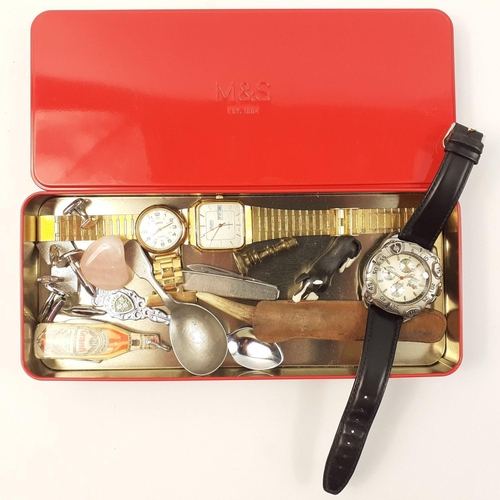 48 - A tin containing watches including one GRUEN quartz, a LORUS nurse's watch and other interesting ite... 