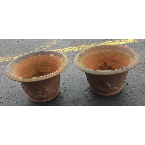 502 - Pair of terracotta garden planters with raised leaf design. W: 36cm H: 23cm D: 36cm#505