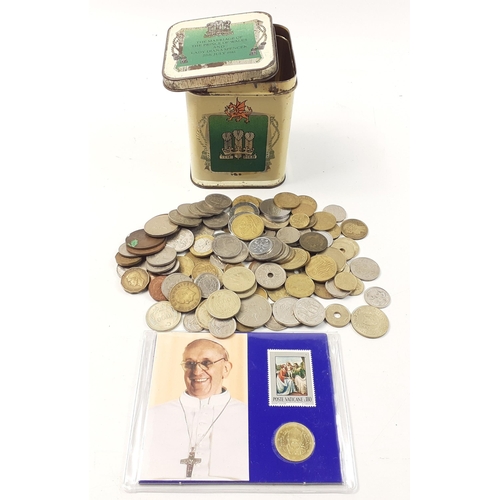 51 - A tin containing a small quantity of mainly obsolete European pre-Euro coinage and a Vatican 50 cent... 