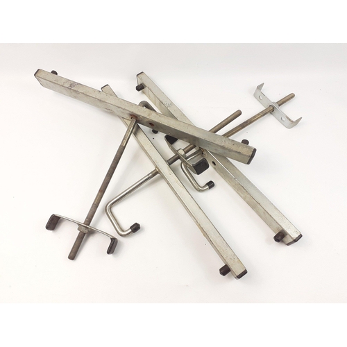 529 - A set of aluminium 3 piece roof ladder clamps#532