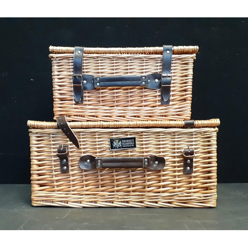 546 - Two Regency Hampers wicker baskets with leather fastenings, measuring W50 x H24 x D37cm and W41 x H2... 