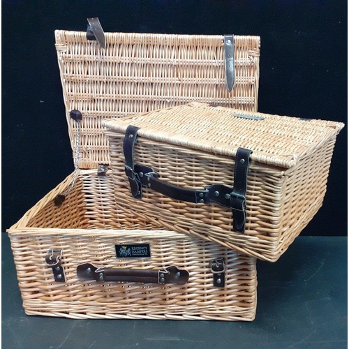 546 - Two Regency Hampers wicker baskets with leather fastenings, measuring W50 x H24 x D37cm and W41 x H2... 