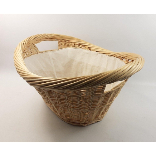 561 - A nice quality wicker twin-handled lined laundry basket in unused condition width 64cm approx#564... 