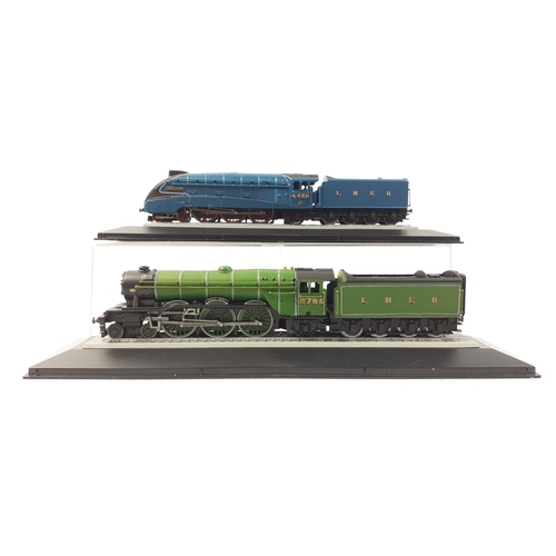 570 - A mixed lot to include 4 diecast trains - 2 Corgi locomotives and 2 RNLI related, various glass anim... 