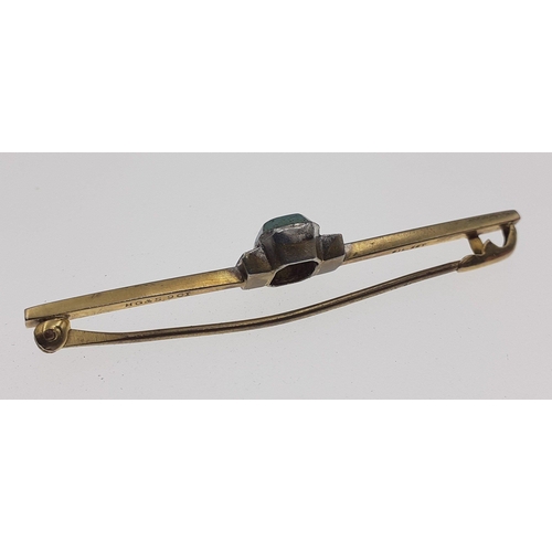 6 - A 9ct marked bar brooch with lovely turquoise hard stone centre and 4 clear stones made by HG &S... 