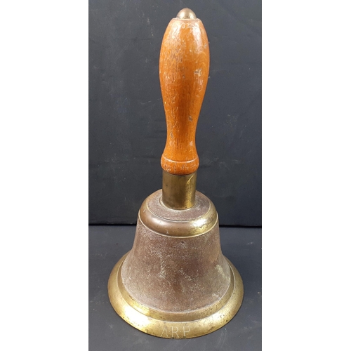 66 - An ARP handbell dated 1939 by G&J.  Stands 25cm high#66