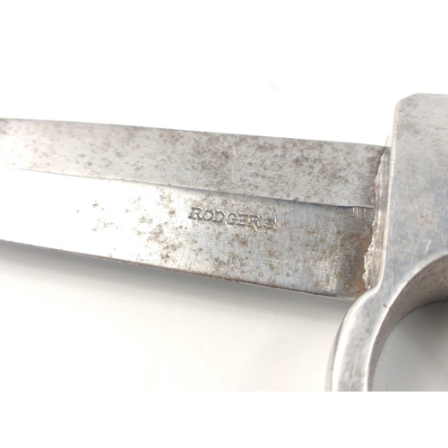 73 - A rare Rodgers of Sheffield knuckle-duster fighting knife of aluminium and steel.  Rare to find with... 