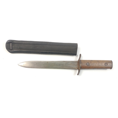 76 - An unmarked wood handled short sheathed fighting style knife 27cm long in leather scabbard.  Initial... 