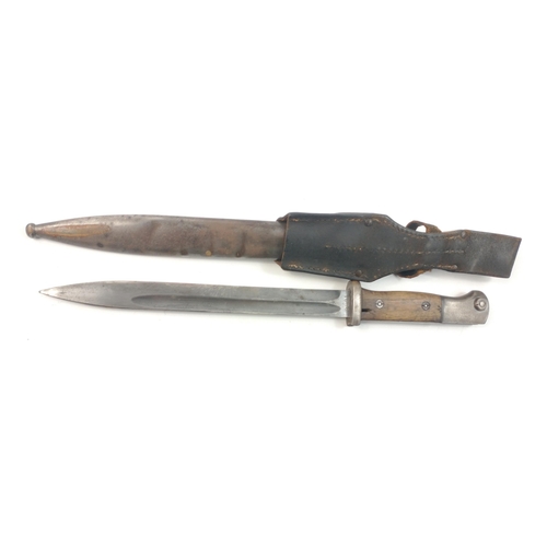 79 - A military bayonet with metal scabbard and frog in good order.  Blade stamped RBD29 and marked 1636 ... 