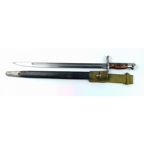 81 - A patent 1913 Remington bayonet with scabbard and canvas frog, blade marked 1917, in lovely conditio... 