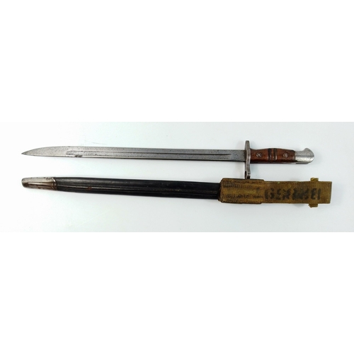 81 - A patent 1913 Remington bayonet with scabbard and canvas frog, blade marked 1917, in lovely conditio... 