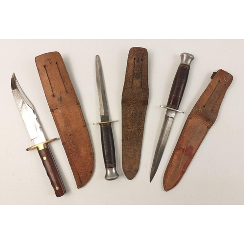 86 - A trio of interesting original sheathed knives to include an unmarked WWII period Rodgers stiletto, ... 