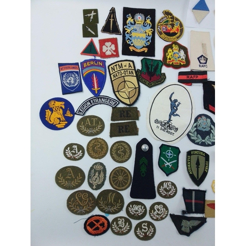 97 - A super collection of military cloth patches from WWII trades to Gulf War period including an Iraqi ... 