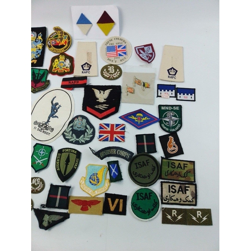 97 - A super collection of military cloth patches from WWII trades to Gulf War period including an Iraqi ... 