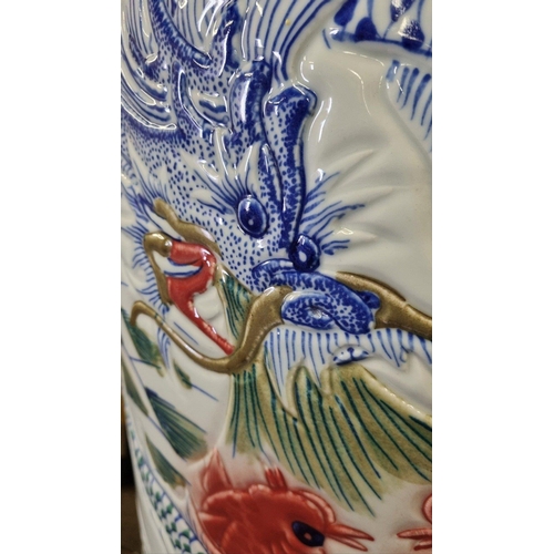 297 - An absolutely stunning original handmade porcelain vase which stands just over 7ft. The vase has gre... 