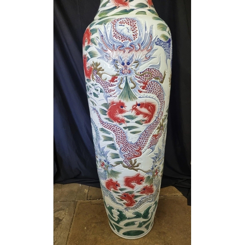 297 - An absolutely stunning original handmade porcelain vase which stands just over 7ft. The vase has gre... 