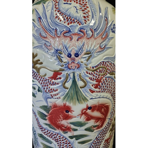 297 - An absolutely stunning original handmade porcelain vase which stands just over 7ft. The vase has gre... 