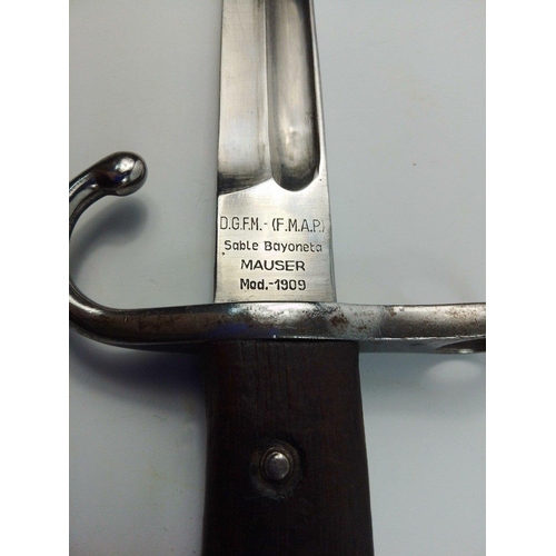 82 - A model 1909 Mauser bayonet in lovely condition with metal scabbard.  Likely post-war Argentinian is... 