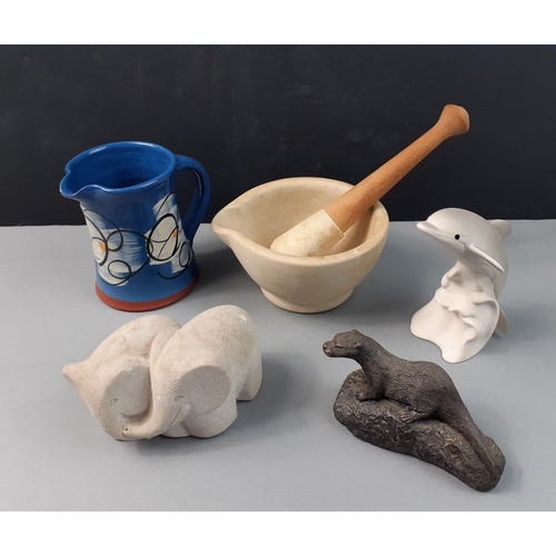 178 - A small collection of ceramics to include an art milk jug, Highbank Pottery dolphin, Marbell elephan... 