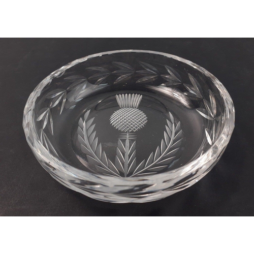 211 - A small crystal pin tray with an etched thistle motif, 10cm dia#51