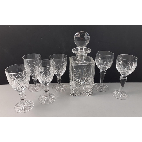 215 - A crystal whisky decanter in excellent condition, 24cm high with 6 various glasses#54