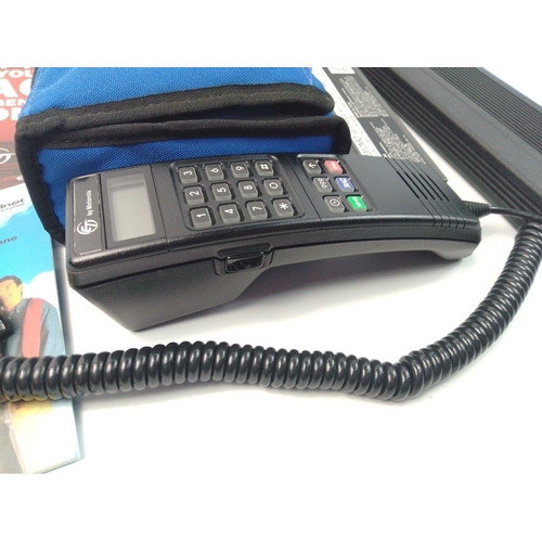 234 - A cased RAC Motorola cellular phone (serial no 6622TG6351).  Appears to be in excellent condition.  ... 