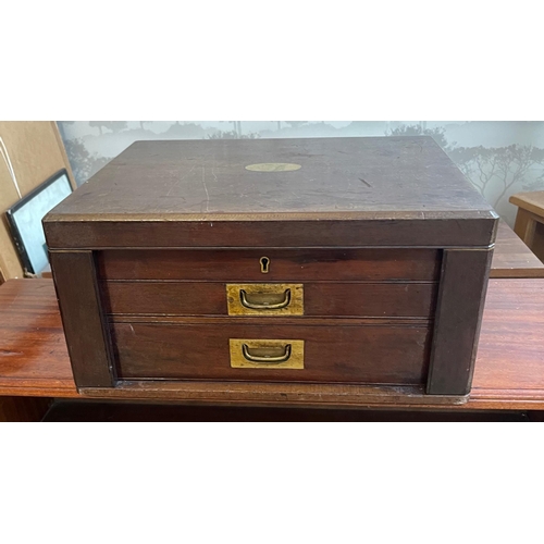 91 - A VICTORIAN substantial mahogany two drawer cutlery canteen with brass outer fittings with fitted in... 