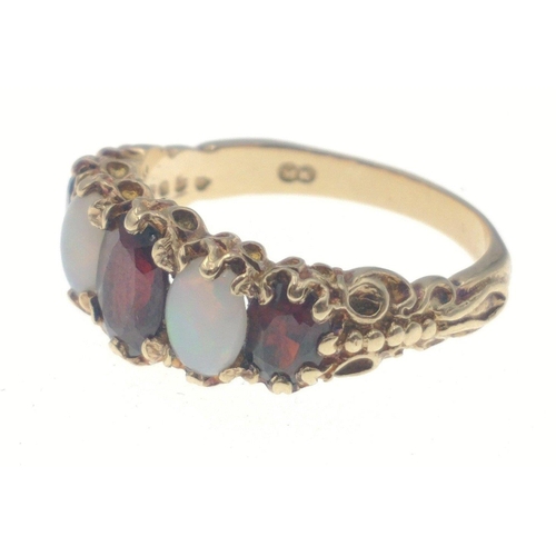 11 - A 375 fully hallmarked opal and garnet ring, largest centre stone measures 6mm approx, size O, gross... 