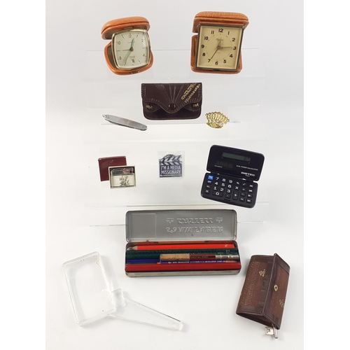 141 - A small mixed lot to include 2 attractive travel alarm clocks by Ingersoll and Olympic and other tri... 