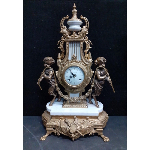 143A - A BREVETTATO (N7087-B77) garniture comprising a very ornate beautifully crafted 19th century clock a... 