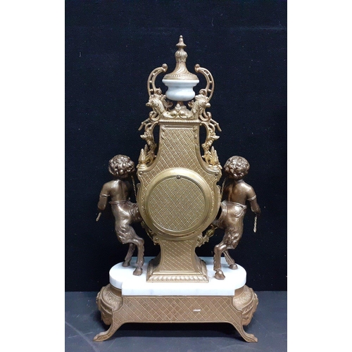 143A - A BREVETTATO (N7087-B77) garniture comprising a very ornate beautifully crafted 19th century clock a... 