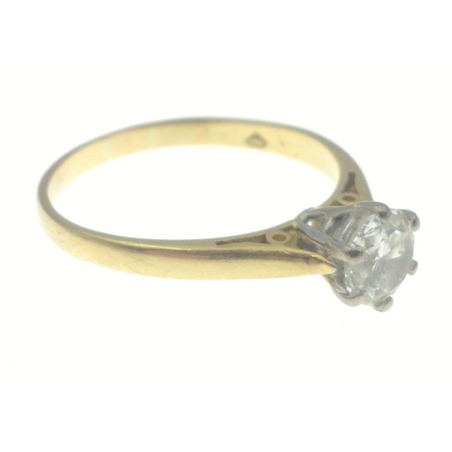 15 - A 750 stamped gold ring with a beautiful 5mm approx (tested) diamond size N, gross weight 2.35g appr... 