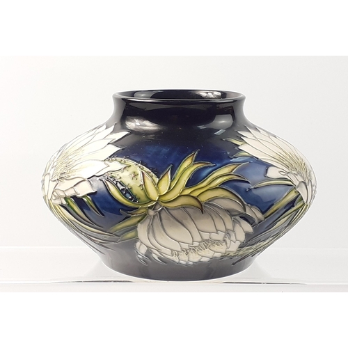 229 - A squat MOORCROFT vase in gorgeous colours, signed to base and dated 2001#231