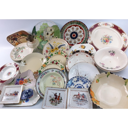 237 - A box of ceramics mainly decorative plates, to include an oil lamp#239