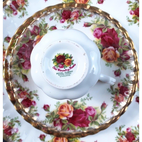 248 - A ROYAL ALBERT Old Country Roses coffee service comprising a serving tray, 6 cups, 6 saucers, 6 side... 