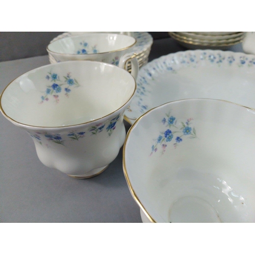 249 - A ROYAL ALBERT Memory Lane tea service to include 6 each of cups, saucers, side plates, 1 milk jug, ... 