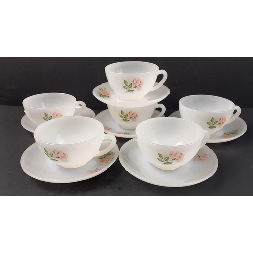 251 - Six each of ARCOPAL teacups and saucers with a small tray.#253