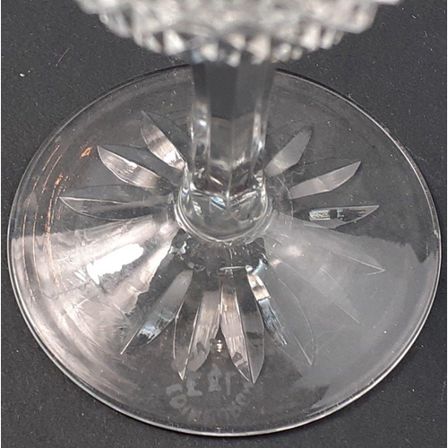 283 - A small decanter (21cm high) in the Edinburgh crystal thistle pattern with 5 small liqueur glasses w... 