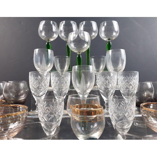 292 - A box of useful glassware to include green stemmed wine glasses, crystal sherry glasses, and others#... 