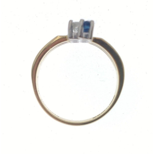 3 - A fully UK hallmarked 18ct gold ring by S&D, stamped Starlight (Singapore), with 4 offset sapphi... 