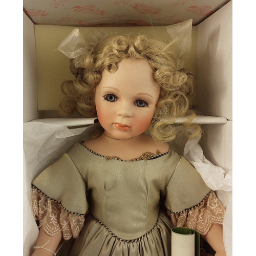 309 - A large porcelain doll in a box with certificate by JC Leonhardt for Hannah UK limited edition 275/7... 