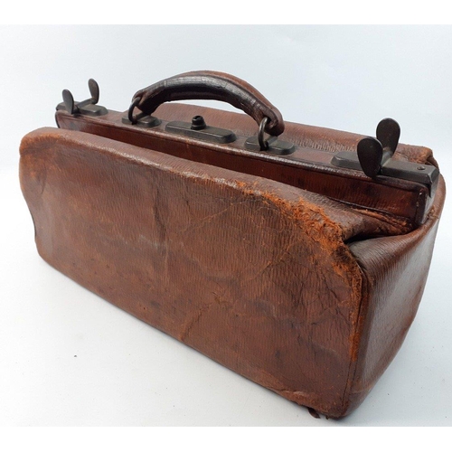 335 - WHATS UP DOC? - A GLADSTONE bag in nicely worn condition with intact catches, 40cm across approx#338... 