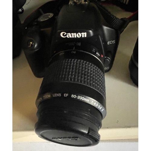 389 - A CANON digital camera 450D which comes with two compatible lenses and a CANON camera bag in black, ... 