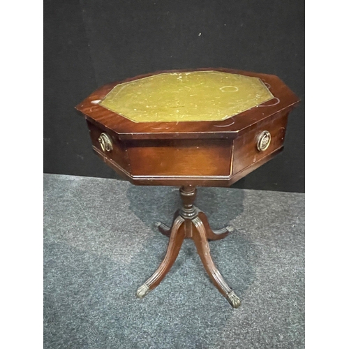 452 - An OCTAGONAL drum-style table with green leather top on 4 leg supports - 45cm diameter x 60cm height... 