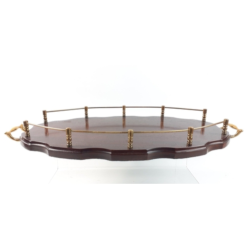 481 - A wooden brass galleried tray with handles, length 54cm approx.  In good condition.#487