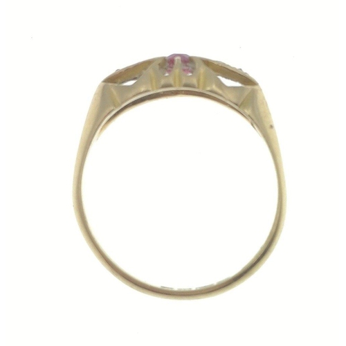 5 - An 18ct gold ring with 4 small diamonds (tested), and a central red stone, fully hallmarked, gross w... 