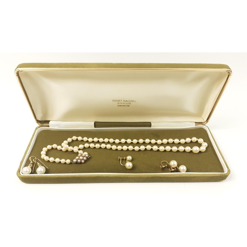 58 - A string of pearls, 47cm long, clasp stamped DHJ with full 375 hallmark clasp plus 1 pair of earring... 