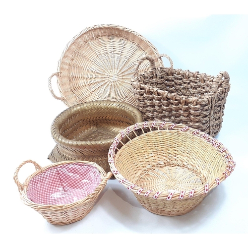 584 - Five wicker baskets of various sizes#590